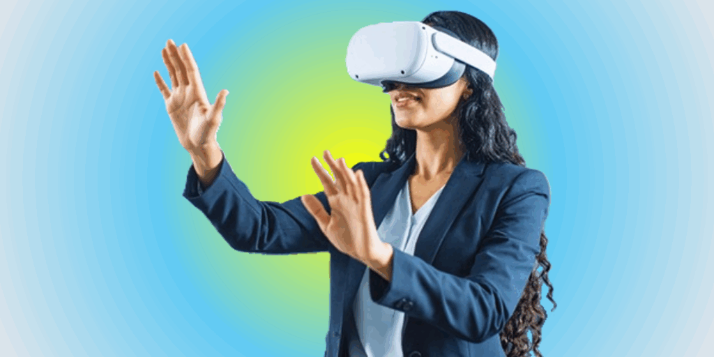 Woman wearing virtual reality headset with hands raised in the air.